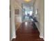 Inviting foyer featuring hardwood floors and neutral paint, leading to the living room at 905 Roxburgh Ave, Rock Hill, SC 29732