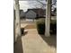 The home's front porch showing landscaping and an angled view of the front yard from under the covered entry at 905 Roxburgh Ave, Rock Hill, SC 29732