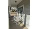 Cozy front porch featuring a pair of rocking chairs, creating a relaxing outdoor space at 905 Roxburgh Ave, Rock Hill, SC 29732