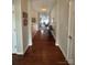 An entrance hallway showcasing hardwood floors leading to an open-concept living area at 905 Roxburgh Ave, Rock Hill, SC 29732