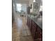Lovely kitchen and breakfast nook features black countertops, wood cabinets and tile floors at 905 Roxburgh Ave, Rock Hill, SC 29732