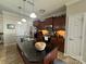 Modern kitchen with stainless steel appliances, dark cabinetry, and a large center island at 905 Roxburgh Ave, Rock Hill, SC 29732