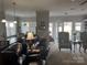 Open-concept living room with an eat-in kitchen island and plenty of seating at 905 Roxburgh Ave, Rock Hill, SC 29732