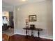 Home interior with decorative lamp, artwork and hardwood floors leading to the living room at 905 Roxburgh Ave, Rock Hill, SC 29732
