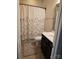 Neat bathroom featuring a shower-tub combination, vanity, and patterned shower curtain at 1112 Avalon Pl, Stallings, NC 28104