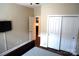 Bedroom featuring closet and dark wood floors with entry to another room at 1112 Avalon Pl, Stallings, NC 28104