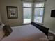 Inviting bedroom boasts natural light, outdoor views, and a calm atmosphere at 1112 Avalon Pl, Stallings, NC 28104