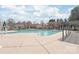 Large community swimming pool with an open, inviting design and lots of concrete for lounging at 11122 Aprilia Ln, Cornelius, NC 28031