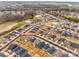 Aerial shot showcasing a Primary-planned community, featuring a pool, landscaping, and modern homes at 11810 Red Leaf Dr, Charlotte, NC 28215