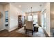 Cozy dining area with a rustic table set and plenty of natural light at 11810 Red Leaf Dr, Charlotte, NC 28215