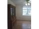 Cozy dining room with a window and a classic china cabinet against neutral walls at 120 24Th Street St, Hickory, NC 28601