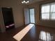 Inviting living room with natural light, neutral walls, and stylish wood-look flooring at 120 24Th Street St, Hickory, NC 28601