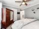 Bedroom featuring a ceiling fan, neutral colors, and natural light at 12510 Pine Terrace Ct, Charlotte, NC 28273