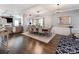 Elegant dining room featuring hardwood floors, modern lighting, and stylish decor at 12510 Pine Terrace Ct, Charlotte, NC 28273