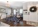 Stylish living room featuring hardwood floors, chic decor, and ample natural light at 12510 Pine Terrace Ct, Charlotte, NC 28273