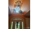 Dramatic entryway featuring a chandelier, high ceilings, and stained glass window at 1308 Moonshadow Ln, Shelby, NC 28150