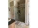 This bathroom features an enormous tiled shower stall with glass doors and tiled flooring at 1308 Moonshadow Ln, Shelby, NC 28150