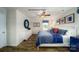 Comfortable bedroom featuring a ceiling fan, window, and a white dresser at 1314 37Th Avenue Ne Ln, Hickory, NC 28601