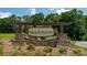 Welcome sign for 'Falls at Hickory' with stone base and lush landscaping at 1314 37Th Avenue Ne Ln, Hickory, NC 28601