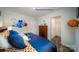 Bedroom with a bed, dresser, and basketball-themed wall decor at 1443 Mammoth Rd, Hickory, NC 28602