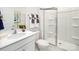 Bright bathroom featuring a walk-in shower with built in seat at 1447 Mammoth Rd, Hickory, NC 28602