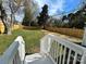 A well-maintained back yard featuring a lawn and a wooden privacy fence at 1946 Academy St, Charlotte, NC 28205