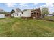 Lawn with red brick and white siding on home exterior at 230 Dunham Ave, Salisbury, NC 28146