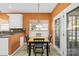 Charming dining area featuring a wooden table, four chairs, and natural light at 2966 Huckleberry Hill Dr, Fort Mill, SC 29715