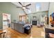 Bright living room with vaulted ceilings, skylights, fireplace, and hardwood floors at 2966 Huckleberry Hill Dr, Fort Mill, SC 29715