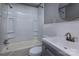 Updated bathroom with a gray vanity, modern sink, and a combined tub and shower at 326 Mountain View St, Gastonia, NC 28052