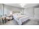 Bright and airy main bedroom with neutral tones and comfortable furnishings at 4124 Woodfox Dr, Charlotte, NC 28277