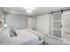 Calm main bedroom features a closet and sliding door to bathroom at 4124 Woodfox Dr, Charlotte, NC 28277