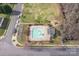 Aerial view of community pool, playground, and green spaces offering recreational opportunities at 623 Hicklin Dr, Rock Hill, SC 29732