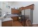 Modern kitchen featuring ample cabinetry, granite countertops, and stainless steel appliances at 623 Hicklin Dr, Rock Hill, SC 29732