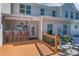 Back deck with covered outdoor bar space and stone patio, great for relaxing or entertaining at 623 Hicklin Dr, Rock Hill, SC 29732