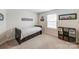 bedroom with a single bed, window, and 'Trenton' wall decor at 7027 Waterwheel St, Concord, NC 28025