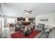 Open-concept living room with a dining area and a modern kitchen, perfect for entertaining at 7027 Waterwheel St, Concord, NC 28025