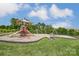 Community playground featuring slides, swings, and a shaded play area at 7027 Waterwheel St, Concord, NC 28025