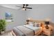 Light and airy bedroom boasting a modern ceiling fan and neutral color palette at 7214 Benita Dr, Charlotte, NC 28212