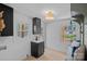 Bright mudroom with granite countertop, built-in bench, and natural light at 7214 Benita Dr, Charlotte, NC 28212