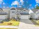 Beautiful two-story home featuring a two-car garage and well-manicured lawn in a friendly neighborhood at 8005 Rolling Wheels Rd, Charlotte, NC 28215