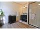 Stylish bathroom with a dark vanity, large mirror, and sleek glass shower at 816 Osteen Rd, York, SC 29745