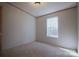 Carpeted bedroom with a window provides natural lighting and a comforting ambiance to the room at 816 Osteen Rd, York, SC 29745