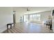 Inviting living room filled with natural light showcasing neutral walls and wood-look flooring at 816 Osteen Rd, York, SC 29745