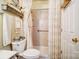 Neat bathroom with a walk-in shower, toilet, and decorative shelving at 10202 Little Whiteoak Rd, Charlotte, NC 28215