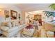 Bright living room seamlessly connects to dining area with elegant furnishings at 10202 Little Whiteoak Rd, Charlotte, NC 28215