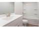 Clean and bright bathroom featuring a shower-tub combo, modern vanity, and tile flooring at 131 Jacobs Hill Pl, Troutman, NC 28166