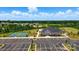 Aerial view of the community clubhouse, tennis courts, parking lot, and scenic landscaping at 1453 Ardmore Dr # 240, Sherrills Ford, NC 28673