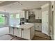 Modern kitchen featuring white cabinets, stainless steel appliances, and large center island at 1453 Ardmore Dr # 240, Sherrills Ford, NC 28673
