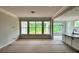 Open-concept living area featuring abundant natural light and seamless flow into kitchen at 1453 Ardmore Dr # 240, Sherrills Ford, NC 28673